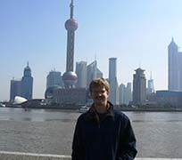 Seth Alberty at the Bund in Shanghai overlooking Pudong and the HuangPu River