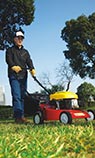 Seth Alberty using a lawn mower engineering sample