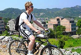 Seth Alberty on a 2 stroke motor bike outside of Wenling China in Zhejiang Province