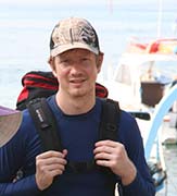 Seth Alberty wearing a travel backpack in Lombok, Indonesia